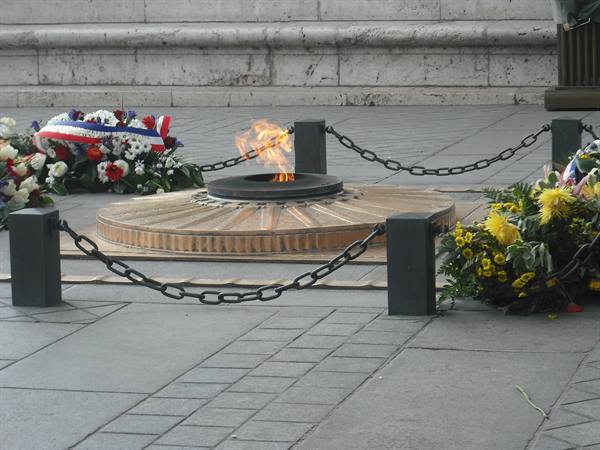 Eternal flame at the Tomb of the Unknown Soldier, Arc de Triomphe, Paris