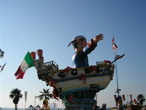 Viareggio Carnival float: papier-mâché ship with figures and Italian flag