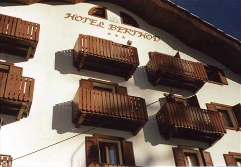 Hotel Berthod facade with wooden balconies under the sun