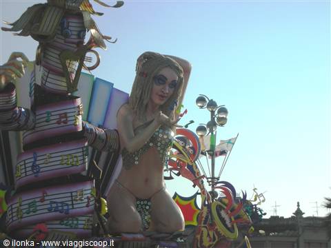 Carnival float with showgirl in sequined bikini at Viareggio Carnival