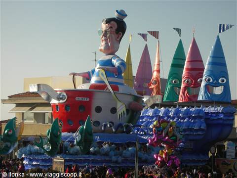 Giant sailor float on a paper-mâché boat at Viareggio carnival parade