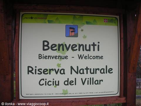 Wooden welcome sign of the Ciciu del Villar Nature Reserve