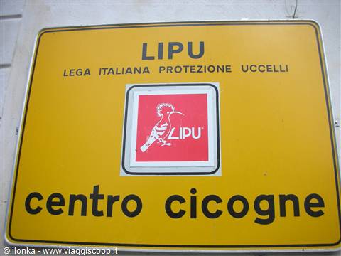 Yellow LIPU sign with hoopoe logo reading centro cicogne, stork center