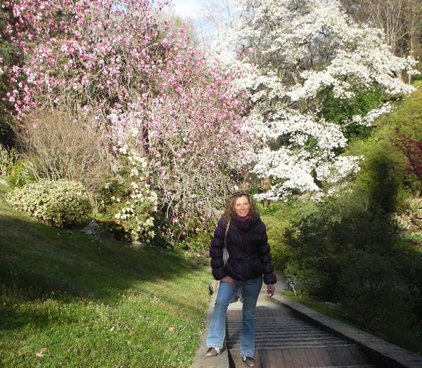 me and the blossoming backdrop of the gardens