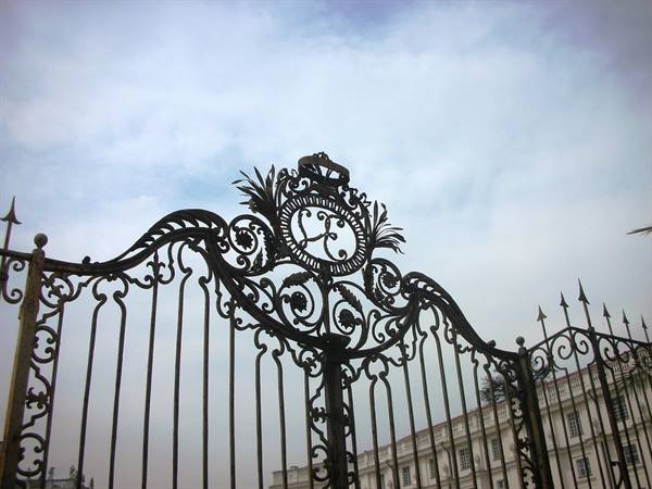 initials of Vittorio Emanuele on the gate
