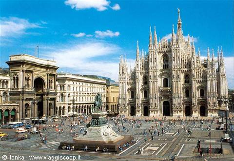Piazza del Duomo in Milan: gothic marble cathedral, equestrian statue and gallery