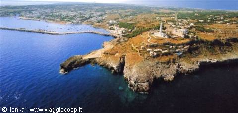 The Santa Maria di Leuca lighthouse overlooks limestone cliffs above the blue sea