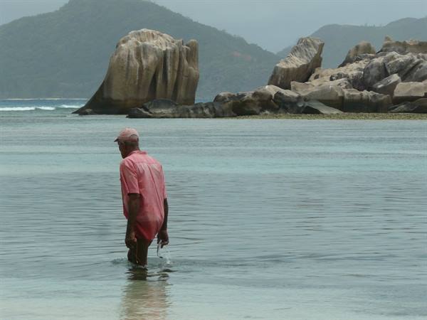 Fisherman at Anse La Reunion