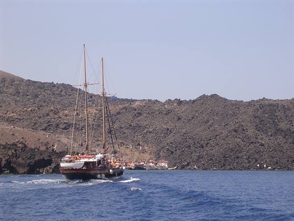 By boat in the caldera