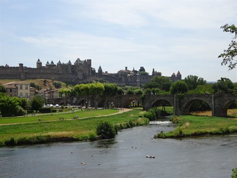 Carcassonne: the medieval walled city above the Aude river and old stone bridge