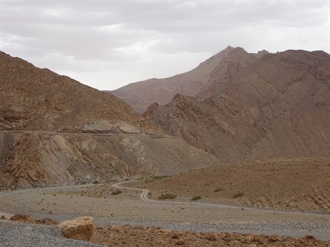 Road winding through arid rocky mountains near Tinghir