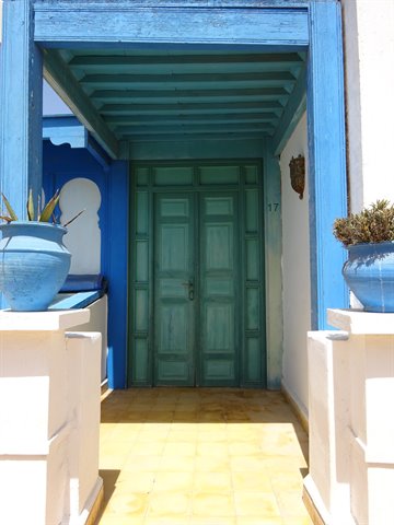 Blue and green painted entrance with pottery vases, Kasbah of the Udayas, Rabat