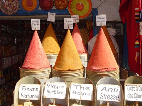 Colorful spice cones at the Marrakech market