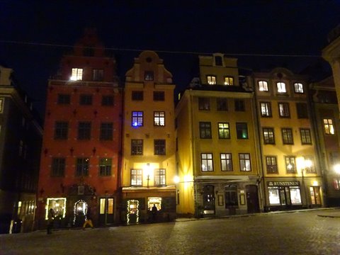 Stortorget, Gamla Stan: colorful buildings lit at night in the square