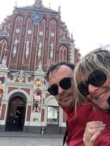 Couple taking selfie in front of the House of the Blackheads, Riga