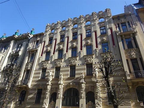 Art Nouveau facade with ornate sculptures and balconies, Riga