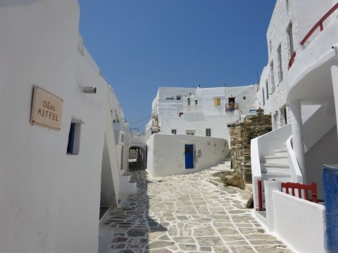Paved alley between whitewashed houses in Kastro, Sifnos
