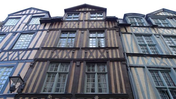 Half-timbered houses guarding centuries of stories. ?