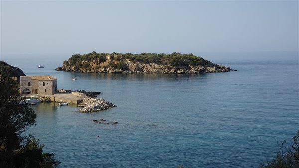 The calm sea and that little island: a silence that fills the heart.
