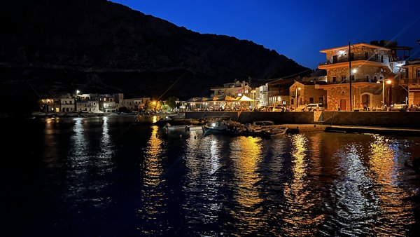 The harbour lights up at sunset: dancing lights on the water, a happy heart.