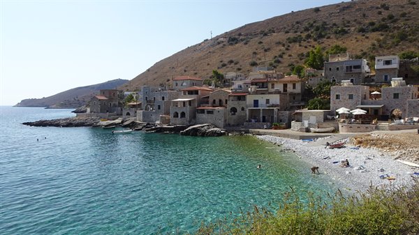 Turquoise waters and stone houses: our little corner of Greek peace.