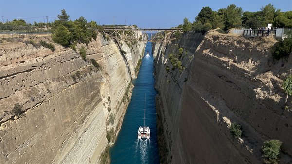 The Corinth Canal: our tiny boat between immense walls.