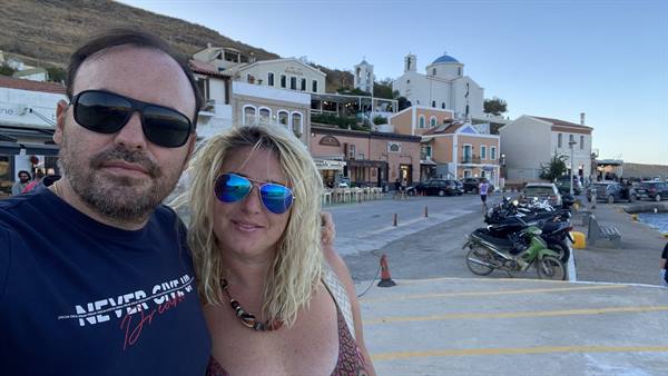 A Greek sunset together: a simple moment, a memory forever.