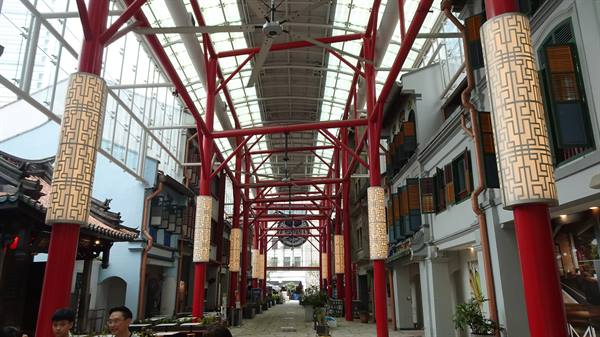 Under the red of Chinatown, the heart beats slow and bright.