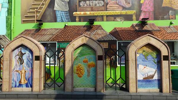 Three stone arches with painted panels and murals, Arab Street, Singapore