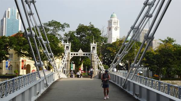 Crossing the Cavenagh Bridge, with the clock marking our memories.