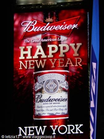 Red Budweiser billboard with Happy New Year New York sign