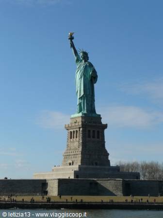 The copper Statue of Liberty on its stone pedestal, New York