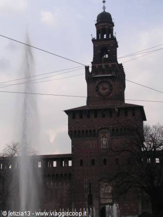 Sforza Castle tower with fountain, grey sky and power lines