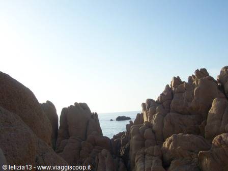 Red granite rocks frame the sea at Capo Testa, Sardinia