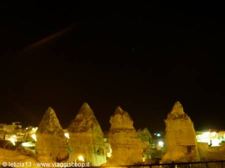 Illuminated fairy chimneys at night in Göreme, Cappadocia
