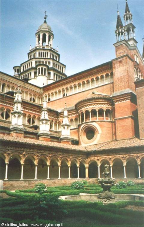 Charterhouse of Pavia cloister with fountain, brick arcades and marble tower