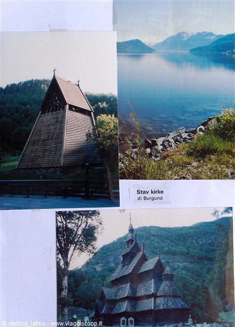Wooden Borgund stave church and fjord surrounded by mountains