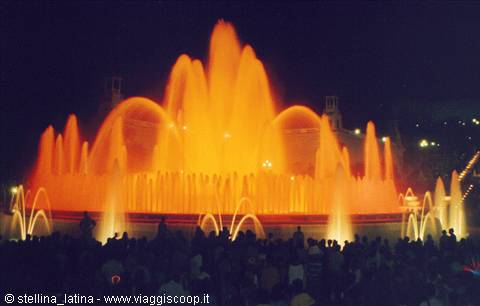 Montjuïc Fountain in Barcelona, orange illuminated water jets at night