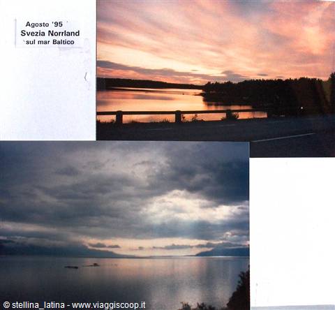 August 1995, Norrland: pink sunset over the Baltic Sea, guardrail and dark clouds on the water