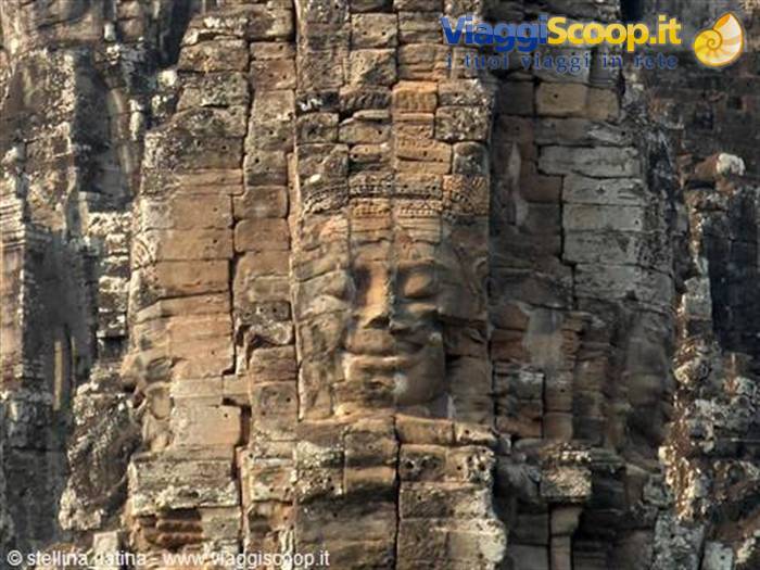 Carved stone faces on the Bayon temple at Angkor Thom