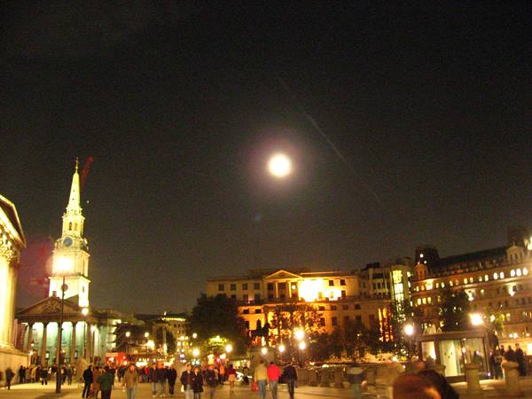 St Martin-in-the-Fields church and crowd in Trafalgar Square under the moon