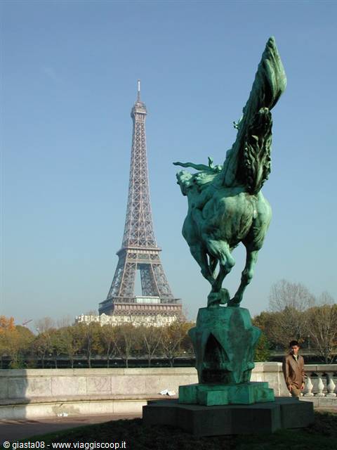 Green bronze horse statue in front of the Eiffel Tower, Paris