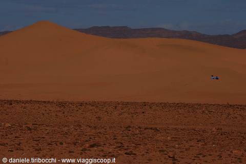 THE DUNES AND THE TUAREG