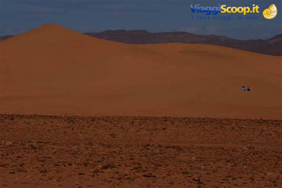 THE DUNES AND THE TUAREG