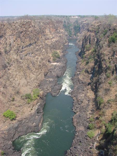 The Zambezi river flows through basalt gorges below Victoria Falls