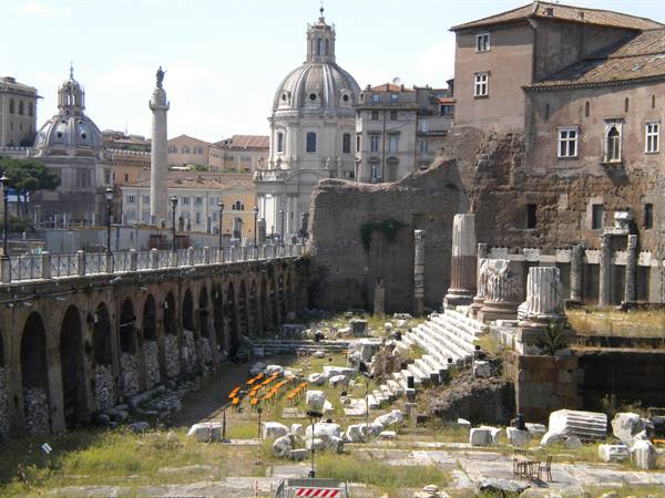 Ancient Roman Forum ruins with columns and arches, Rome