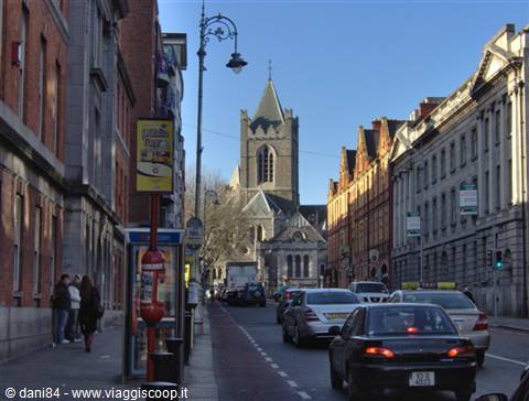Cars queueing on the street toward Christ Church Cathedral in Dublin