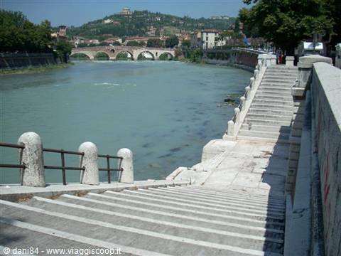 Marble staircase to the Adige river, Ponte Pietra and hill in Verona