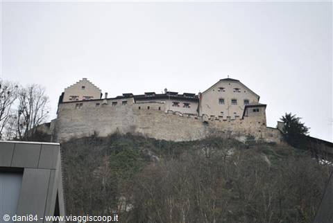 Riedenburg, medieval stone castle atop wooded hill, Liechtenstein