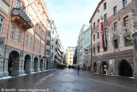 Arcaded street with colorful buildings in Innsbruck